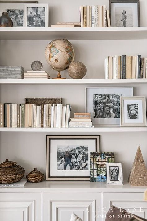 Love this shelf styling! How to style books, photographs, picture frames, and objects on shelves or bookshelves. Lovely neutral colour scheme. PARCELL HOME — ALICE LANE INTERIOR DESIGN Acrylic Shelf Styling, Tv Shelf Decorating Ideas, Shelf Styling With Books, Shelf Astethic, Styling Bookcases, Bookcase Decorating, Shelves Styling, Styled Shelves, Bookshelf Inspo