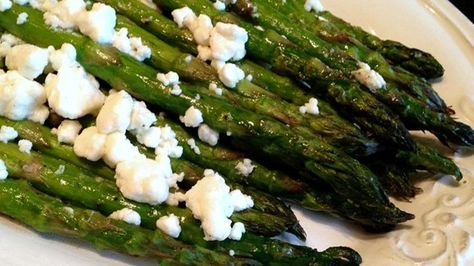 Roasted asparagus with herbed goat cheese is quick and easy to prepare and a great side dish in the spring. Herbed Goat Cheese Recipe, Herb Goat Cheese, Asparagus Recipes Oven, Asparagus Recipes Roasted, Oven Roasted Asparagus, Goat Cheese Recipes, How To Cook Asparagus, Grilled Asparagus, Roasted Asparagus