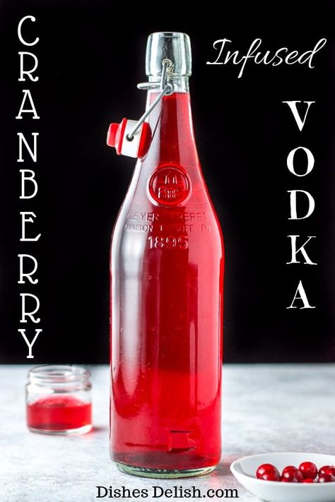 This cranberry infused vodka is delightfully tart!  There is no added sugar because I believe it should be added to the cocktail and not the vodka!!  It's vibrant and delicious! #vodka #cranberry #cranberryvodka #dishesdelish  via @dishesdelish Moonshine Drinks, Infused Spirits, Making Alcohol, Homemade Liqueur, Fruity Cocktail Recipes, Homemade Liquors, Cocktails Vodka, Vodka Cranberry, Infused Liquors