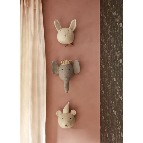 Let's talk about the elephant in the room: cute, fuzzy and perfectly sized to fit above a dresser or bed. Crafted of felted wool, our elephant wall decor sports floppy ears, a wrinkly trunk and a charmingly rumpled crown. Sweet stitching adds just enough detail to this adorable nursery or playroom accent.   • Handmade  • 100% felted wool with embroidered details  • Due to its handmade nature, each item will vary slightly  • Spot clean only  • Made in Nepal Felt Elephant Animal Head Wall Decor Felt Elephant, Bunny Wall Decor, Eclectic Nursery, Animal Head Wall Decor, Luxury Nursery, Head Wall Decor, Elephant Wall Decor, Animal Head Wall, Sports Wall Decor