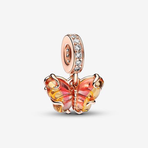 Transform into your best self with the Pink & Yellow Murano Glass Butterfly Dangle Charm. This 14k rose gold-plated charm features Murano glass wings in an orange-and-pink gradient with a cut-out pattern on the back that shows through the glass, and 14k rose gold swirls on the front. Microbeads on the butterfly's body and pavé on the bail add a touch of delicate sparkle. Add this bright butterfly to your look as a powerful symbol of transformation and new beginnings. - Pandora Pink & Yellow Mura Pandora Essence, Pandora Pink, Pandora Rose, Charms Pandora, Disney Classics, Bracelet Pandora, Glass Butterfly, Dangle Charms, Pandora Bracelet