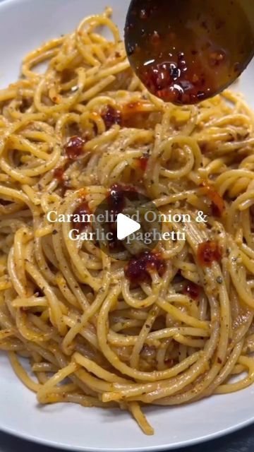 Mediterranean Plan Meal on Instagram: "Caramelized Onion and Garlic Spaghetti 🔥 

Ingredients:
- Chilli oils
-1 large onion, thinly sliced
-4 cloves of garlic, minced, plus more for garlic chili crisp
-2 tablespoons of garlic chili crisp, plus more for serving (we use @ramanokram’s garlic chilli oil - so good)
-Salt and pepper, to taste
-1 cup of coconut milk or cream
-1 teaspoon of dry parsley
-8 ounces of pasta (your choice of shape)
-Olive oil

Instructions:
1. Start by preparing all your ingredients. Thinly slice the onion, mince the garlic, and measure out your garlic chili crisp, coconut milk or cream, and dry parsley. Set aside.
2. In a large skillet over medium heat, add a couple of tablespoons of olive oil. Once the oil is hot, add the sliced onions with a pinch of salt. Cook, st Garlic Chili Crisp, Garlic Chilli Oil, Chilli Pasta, Chili Crunch, Spaghetti Ingredients, Garlic Spaghetti, Chili Crisp, Chilli Oil, Caramelized Onion