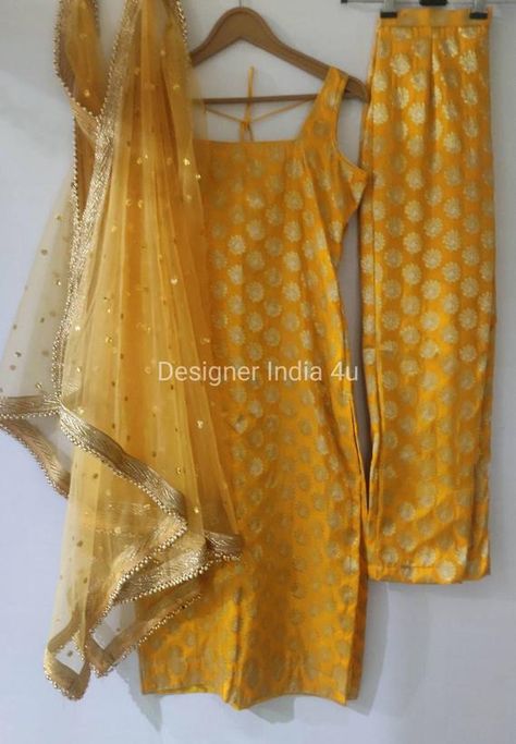 This is a made to order Straight Silk Suit with Pant. Fabric: Pure Banarsi Brocade Silk Kameez Bottom: Is straight pant made in Pure Banarsi Brocade Silk. Dupatta: Beautiful sequence work Net with Lace Borders. I craft it exclusively for my customers by using designer fine quality fabrics. I Maiyan Outfit Salwar Suits, Yellow Silk Suit Designs, Yellow Banarsi Suit, Banarsi Salwar Suit Design, Net Suits Design Indian Straight, Yellow Punjabi Suit For Haldi, Straight Suits With Pants Indian, Yellow Suits Women Indian, Straight Suit Designs With Pants