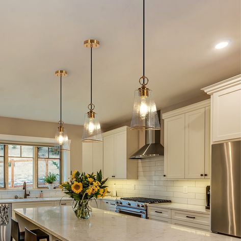 Kitchen with gold hardware