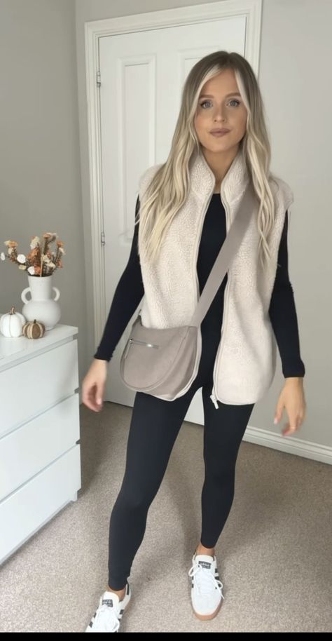 Grey Gilet Outfit Women, Oversized Tan Vest Outfit, Cream Sherpa Vest Outfit, Cream Gilet Outfit Women, Tan Sherpa Vest Outfit, Teddy Vest Outfits For Women, Black Fleece Vest Outfit, White Fuzzy Vest Outfit, White Sherpa Vest Outfit