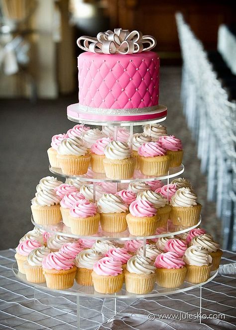 Pink and White Cupcakes Setup Like Wedding Cake Cupcake Tower Birthday Sweet 16, Pink Cupcake Tower, Sweet 16 Cake And Cupcakes, Quinceanera Cupcakes Ideas, Pink And White Cupcakes Ideas, 16 Cupcake Cake, Pink Birthday Cupcakes, Pink And White Cupcakes, Sweet 16 Party Planning