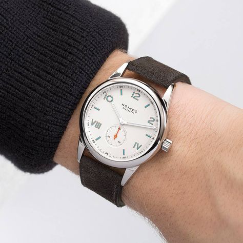 No automatic alt text available. Nomos Club, Nomos Watch, Timepiece Design, Timex Watches, Aviator Watch, Affordable Watches, Amazing Watches, Telling Time, Watch Collection