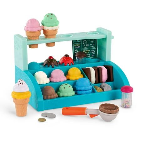 Stack up the fun at your own ice cream shop with the Sweet Sprinkles set from Battat! This 49-piece playset will have little ones serving up unique creations. The working magnetic scooper lets kids stack up 12 ice cream scoops, add toppings, and create ice cream sandwiches to serve up frosty treats from the included menu. With 20 play coins, they can even practice early counting skills as they sell their colorful creations. Theyll also build social skills, improve hand-eye coordination, and deve Ice Cream Toy, Toy Makeover, Sprinkles Ice Cream, Play Ice Cream, Preschool Play, Ice Cream Set, Ice Cream Sprinkles, Pretend Play Kitchen, Ice Cream Scoops