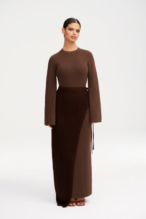 Elevate your wardrobe with our Grace Knit Maxi Dress & Wrap Skirt Set. The subtle flare sleeves add a touch of sophistication, while the color contrasting knit creates a unique and elegant look. With the versatility of a dress and wrap skirt, this set is a must-have for any wardrobe. Model is 5'6 and is wearing size S/56". Fall Wrap Dress Outfit, Knitted Maxi Skirt Outfit, Dresses Fall 2024, Wrapped Skirt Outfit, Maxi Knit Skirt, Red Skirt Outfit Winter, Knit Maxi Skirt Outfit, Modest Outfits Black Women, Maxi Skirt Outfit Fall