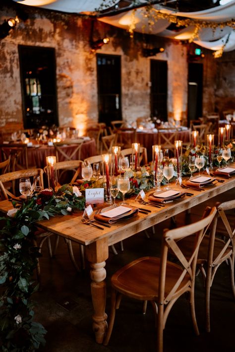 wedding family style seating // Mt Washington Mill Dye House // Baltimore MD // farm tables // garland // greenery // intimate reception dinner // candle lit // burgundy candle sticks // moody // rustic chic // exposed brick // fall wedding inspiration // palette inspiration Wedding No Table Cloth, Burgundy And Copper Wedding, Burgundy Candles, Gold Fall Wedding, Wedding Candles Table, Fall Wedding Tables, Fall Wedding Diy, Moon Wedding, Mt Washington