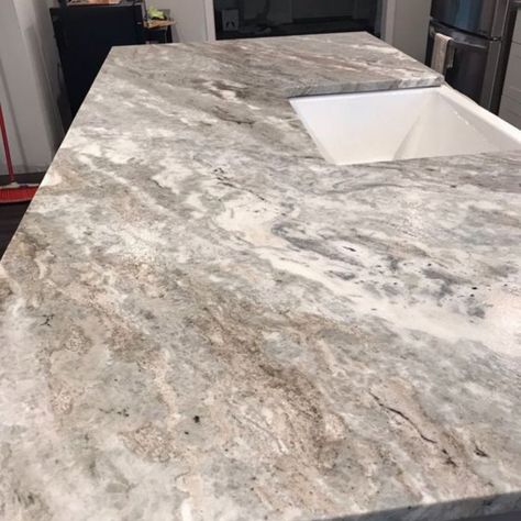 Top 15 Leathered Granite Countertop Ideas | Cornerstone Remodeling Marble Looking Granite, Gray Granite Countertops Bathroom, Granite Countertop Colors, Gray Countertops Kitchen, Leather Granite Countertops, Black Leathered Granite Countertops, Popular Granite Countertops, Gray Granite Countertops, White Fantasy Granite