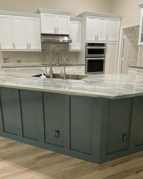 If you want a bit of color in your kitchen, consider using Riverway on the island. It is a great cabinet color, so it should also work for islands. Kitchen Island Color With White Cabinets, Kitchen Cabinets Island Different Color, Painted Kitchen Island With White Cabinets, Island Painted Different Than Cabinets, Paneling On Kitchen Island, Kitchen Island Painted Different Color, Kitchen Different Color Island, Island Cabinet Colors, Painted Kitchen Island Colors