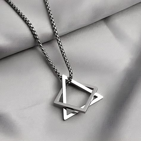 Unleash your inner elegance with this stunning geometric silver necklace. Crafted with precision, the pendant showcases a unique and modern geometric design that effortlessly captures the light. The robust yet delicate chain is designed for comfort and durability, ensuring your piece retains its luster and charm over time. Whether it's a gift or a personal treat, this necklace promises to be a cherished addition to any jewelry collection. Dainty Chain, Jewelry For Men, Delicate Chain, Modern Necklaces, Minimalist Jewelry, Geometric Design, Modern Minimalist, Charm Necklace, Jewelry Collection