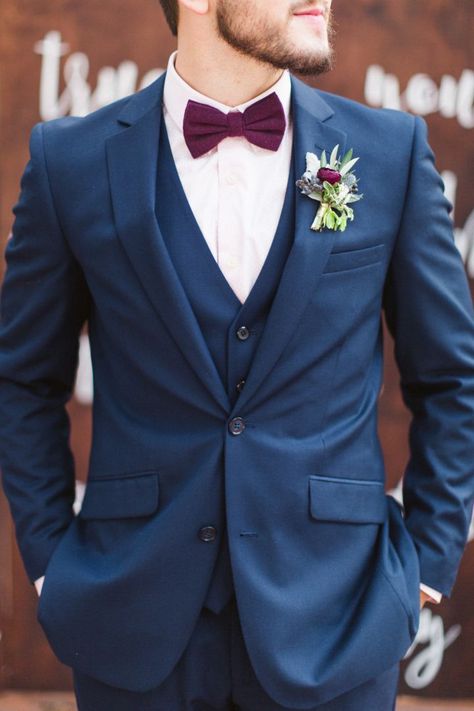 Groom in Navy Blue Suit with burgundy bow tie - Fab Mood | Wedding Colours, Wedding Themes, Wedding colour palettes Groomsmen Colours, Wedding Suits Men Blue, Blue Groomsmen, Burgundy Bow Tie, Costum Elegant, Costume Bleu, Skate 3, Groom Wedding Attire, Blue Suit Wedding