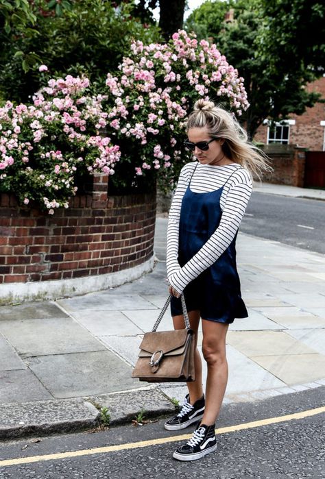 Transition your summer dresses into fall with these stylish outfit ideas for layering T-shirts | 'Fashion Me Now' blogger in white striped long-sleeve tee, black dress, sneakers T Shirt Under Dress, Shirt Under Dress, Estilo Vans, Layered Outfits, Fashion Me Now, Striped Tshirt, Under Dress, Mode Inspo, Mode Vintage