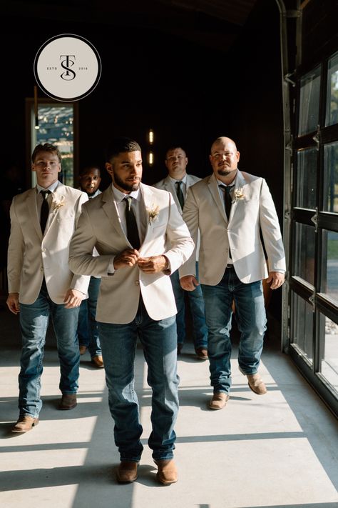 Groom and Groomsmen are #weddingdayready in white dress shirts, ties and tan jackets from @menswearhouse and lightwash jeans and brown boots from @ariatintl #groomsmenstyle #jeansbootsjackets #jeansandbootswedding #cowboywedding #sainteterrewedding Tan Suit Groom And Groomsmen, Dark Jeans Groomsmen, Wedding Men In Jeans, Jean Groom Attire, Tan Vest And Blue Jeans Wedding, Tan Blazer With Jeans Men Wedding, Teal And Rust Groomsmen, Western Wedding Mens Attire Groom And Groomsmen, No Tux Wedding Groom Attire