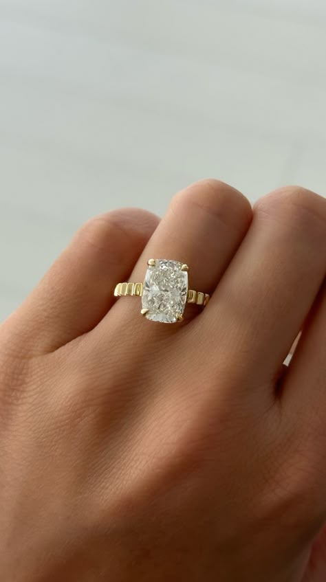 This ring showcases a stunning elongated cushion-cut diamond, balancing modern sophistication with classic charm. As a custom order, you have the opportunity to personalize every detail to reflect your unique love story. Contact us today to discuss your vision and create the perfect piece that captures every sparkle and detail. #engagementring #weddings #proposal #customring Classy Timeless Wedding, Elongated Cushion Cut Ring, Elongated Cushion Cut Engagement Ring, Modern Wedding Rings, Game Wedding, Marriage Material, Ring Cuts, Elongated Cushion Cut, Happiness Challenge