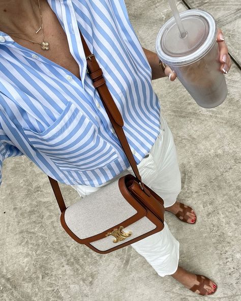 Fashion Jackson June Instagram Recap Fashion Jackson wearing striped shirt white jeans, Hermes sandals, Celine handbag, summer capsule, summer style, summer outfits Hermes Oran Sandals Outfit, Jeans Outfits Summer, Outfits With Striped Shirts, Looks Jeans, Curated Outfit, White Jeans Outfit, Amy Jackson, Casual Chique, Summer Capsule