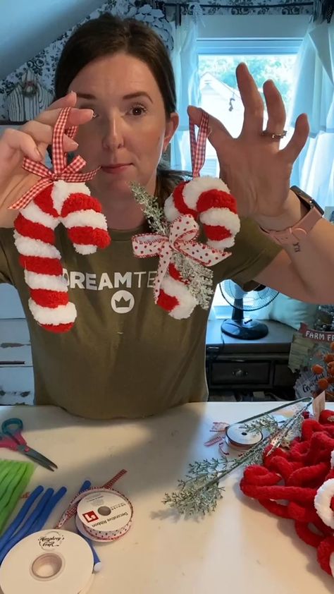 Dollar Tree Christmas Candy Cane Wreath, Candycane Diy Decorations, How To Make Peppermint Candy Decorations, Pom Pom Candy Cane, Chunky Yarn Ornaments Diy, Diy Christmas Candy Cane Decorations, Candy Canes Wreaths, Yarn Wrapped Candy Canes, Candy Cane Yarn Ribbon Wreath