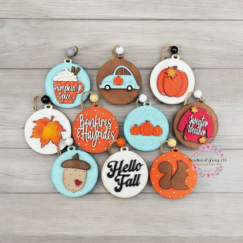 Embrace the beauty of fall with hand-painted autumn ornaments and rustic decorations perfect for celebrating the changing seasons! Wood Ornament Painting Ideas, Autumn Ornaments, Rustic Decorations, Cameo Crafts, Fall Ornaments, Silhouette Cameo Crafts, Teacher Ornaments, Fall Thanksgiving Decor, Painted Christmas Ornaments