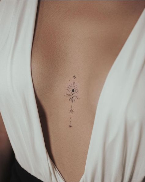 Épinglé sur Tatouage Evil Eye Tattoo On Chest, Evil Eye Unalome Tattoo, Evil Eye Spine Tattoo, Evil Eye Chest Tattoo, Tattoo Entre O Peito, Eye Neck Tattoo, Delicate Sternum Tattoo, Tattoo Peito, Tattoo Between Breast