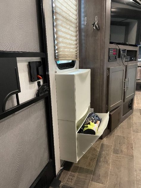 Camper Hidden Storage, Rv Storage Clothes, Rv Boot Storage Ideas, Camper Pet Ideas, Shoe Storage Rv Travel Trailers, Under Camper Storage, Rv Ikea Storage, Adding Storage To Camper, Shoe Storage In Camper