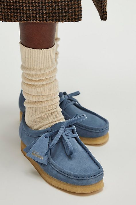 A timeless classic returns: these moccasins from Clarks feature the same details you know and love from the original style. **Features:** Slip-on style, suede uppers, round toe, mocc stitching, EVA midsole, natural rubber crepe sole, 2-eyelet lace-up closure, branded fob **Why We | Clarks Wallabee Moccasins at Free People in Blue, Size: US 9 Clarks Aesthetic, Outfits With Blue Shoes, Wallabees Clarks, Clarks Wallabees Outfit, Moccasin Outfit, Clark Wallabees, Wallabees Outfit, Wallabee Clarks, Blue Shoes Outfit