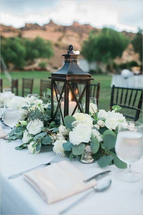 outdoor lantern wedding centerpiece / http://www.himisspuff.com/100-unique-and-romantic-lantern-wedding-ideas/8/ Green Wedding Centerpieces, Beach Table Decorations, Summer Wedding Centerpieces, Greenery Wedding Centerpieces, Garden Wedding Centerpieces, Lantern Decor Wedding, Lantern Centerpiece Wedding, Rustic Wedding Decorations, Lantern Centerpieces