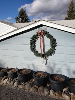 Hula Hoop Outdoor Wreath. Hula Hoop Wreath, Weighted Hula Hoops, Outdoor Wreath, Hoop Projects, Group Project, Outdoor Wreaths, Large Wreath, Hula Hoop, Church Decor