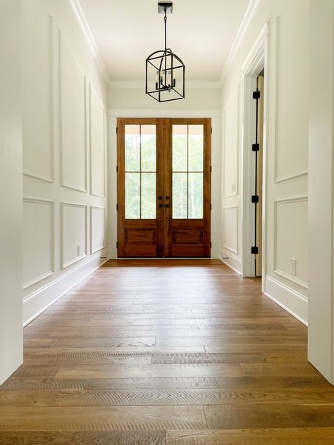 Hallway Crown Molding Ideas, Traditional Picture Frame Molding, Hallway Framing Ideas, Frame Molding Hallway, Foyer Molding Entryway, Foyer Paneling Entrance, Entryway With Molding, Wall Paneling Foyer, Wall Moulding Entry Way