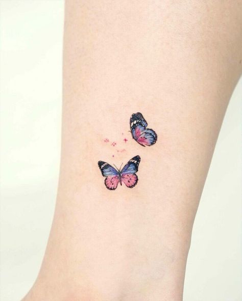 Tiny Colorful Ankle Butterfly Tattoos Small Butterfly Tattoo Color, Tattoo Ankle Ideas, Butterfly Tattoo Ankle, Small Butterfly Tattoo On Wrist, Butterfly Tattoo Color, Butterfly Ankle Tattoo, Small Butterfly Tattoos, Butterfly Ankle Tattoos, Nose Tattoo