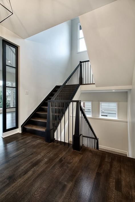 Black staircase paint color Black Newel posts, railing and spindles are painted in Benjamin Moore Black #BenjaminMooreBlack #blackstaircase #paintcolor Black Staircase, Painted Staircases, Stair Case, Home Stairs Design, Lan Can, Up House, Custom Home Designs, House Stairs, Staircase Design