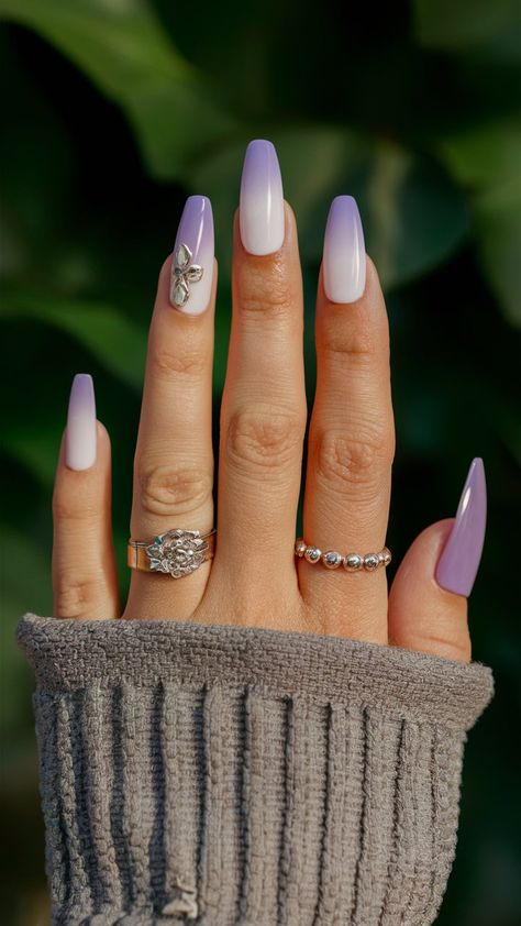 -Embrace tranquility with this stunning lavender ombre nail design! The soft gradient blends shades of lavender into a delicate finish, creating a calming and chic look. Perfect for springtime or any occasion that calls for a splash of color, these nails exude elegance and creativity. Pair them with pastel outfits for a fresh, harmonious vibe! 💜✨ #OmbreNails #LavenderNails #NailArtInspiration Lavender Ombré Nails, Lavender Ombre Nails, Silver Ombre Nails, Nails Lavender, Ombre Nail Design, Lavender Ombre, Pastel Outfits, Soft Gradient, Shades Of Lavender