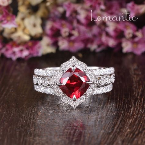 3ct Ruby Art Deco Engagement Ring Set Half Eternity Wedding Ring 7mm Cushion Cut Ruby Diamond Ring Bridal Set July Birthstone Ring Milgrain here is the wedding band: https://www.etsy.com/listing/1485564424/ ❥ Product Information ❥ Width: about 1.6-2mm * Center Stone  Metal Type:lab ruby stone(Color D-E-F, Clarity VVS) Shaped: Cushion Cut Size: 7mm * Side Stone  Metal Type: Colorless Moissanite or lab-grown diamond Weight: Approx 0.5ct ❥ENGRAVING❥ Up to 25 letters  --------------------------- ❥PAYMENT PLANS❥ The first payment is starting at $100, then the rest payment can be divided into several payments. Total payment period is 3 months.  Just let me know your idea and I can make you a listing for the layaway.  ---------------------------- ❥PERSONALIZED ORDER❥ The answer is YES! Message an Ruby Jewelry Ring, Art Deco Engagement Ring Set, Eternity Wedding Ring, July Birthstone Ring, Ruby Diamond Ring, Ruby Diamond Rings, Art Deco Engagement, Deco Engagement Ring, Ruby Jewelry