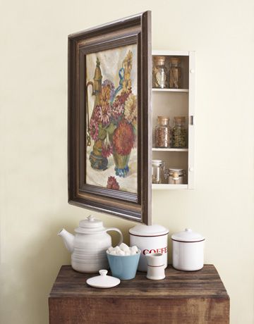 Hidden cabinet storage behind a vintage (or not) painting. This could be cute for many types of storage. I'm loving this example of using it for spices because I need a good space to keep mine that isn't stuffed up in a high cabinet where they're harder to easily access. Old Medicine Cabinets, Hidden Cabinet, Secret Hiding Places, Diy Muebles Ideas, Inexpensive Crafts, Diy Casa, Cheap Crafts, Diy Decor Crafts, Vintage Cabinets