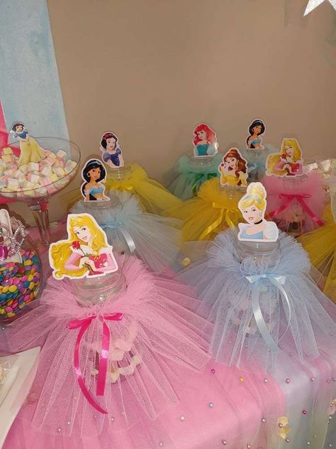 Disney Princess | CatchMyParty.com Disney Princess Theme Centerpieces, Princess Theme Table Decorations, Disney Princess Birthday Party Decorations Diy, Disney Princess Birthday Centerpieces, Disney Princess Table Centerpiece, Disney Princess Table Decorations, Disney Princess Centerpiece Ideas, Princess 5th Birthday Party Ideas, Princess Birthday Party Centerpieces