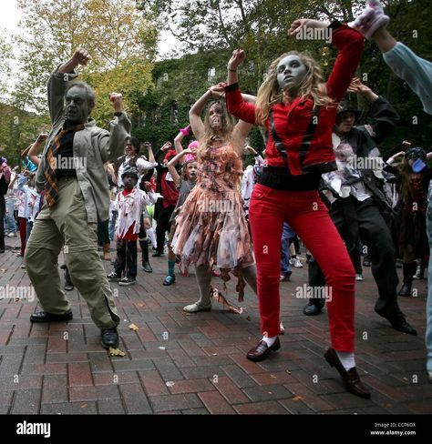 Download this stock image: Oct. 23, 2010 - Seattle, Washington, USA - 278 people dressed as zombies to dance in Occidental Park to Michael Jackson's ''Thriller'' as part of the Thrill the World attempt to break the world record for largest simultaneous Thriller dance. Groups in cities all over the world participated. Decem - CCP6DX from Alamy's library of millions of high resolution stock photos, illustrations and vectors. Thriller Dance, Washington Usa, World Record, People Dress, Seattle Washington, World Records, Michael Jackson, South Carolina, Zombie