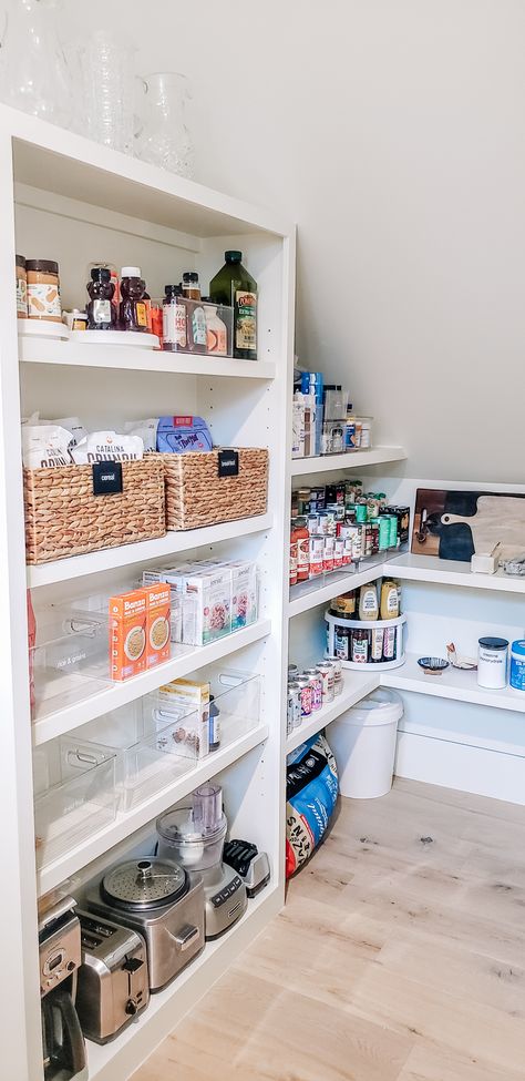 We love the challenge a different-shaped space brings us. In this pantry with a slanted ceiling, we were able to utilize every inch to its maximum potential! #organizing #organizingtips #organizingideas #homeorganizing #professionalorganizing #organizinginspiration #organizingsolutions #organizinggoals #organization #organizedlife #nashville #nashvilleorganizing #movingconcierge #unpacking #fyp #moveconcierge #unpackingnashville #kitchen #kitchengoals #kitchenorganization #kitcheninspo Slanted Ceiling Pantry, Beach House Pantry, Stairs Pantry, Under Stairs Pantry, Pantry Organization Hacks, House Pantry, Organized Pantry, Slanted Ceiling, Pantry Shelving