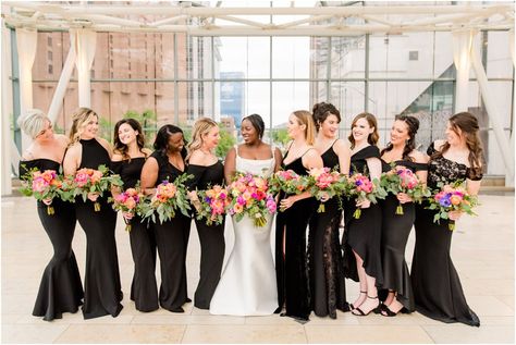 Stain Bridesmaid Dresses, Black Bridesmaid Dresses Bright Florals, Black With Bright Colors Wedding, Black Wedding With Bright Flowers, Black Bridesmaid Dress With Colorful Flowers, Black Bridesmaid Dress Colorful Bouquet, Black Bridesmaid Dresses Colorful Bouquets, Black Wildflower Wedding, Black Summer Wedding Color Schemes