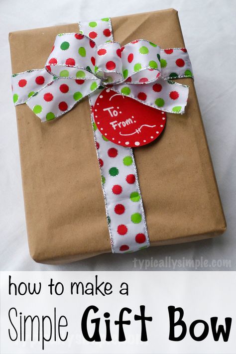 This easy to make gift bow is perfect for adding to Christmas gifts. Ribbon On Presents, Gift Bow Tutorial, Christmas Present Bow, Bows For Presents, Diy Gift Bow, Christmas Gift Bow, Package Bows, Christmas Bows Diy, Bows Diy Ribbon