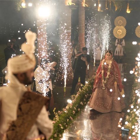 The nervous flutter in your heart, the dazzling fireworks painting the night sky, and breathtaking aesthetics decor that leave you speechless. This is what a truly unforgettable bridal entrance feels like.😍 Lets plan one such entry for you💫 . . . . . . . . #indianwedding #weddingplanner #weddingdecor #ahmedabadweddingplanner #weddingplannerinahmedabad #hastmelapweddings #bridalentry #bridesday #fireworks #weddingentry [ Event planning | Event Decor | Reception | Ahmedabad | Wedding planner | ... Cold Fire Wedding Entry, Fireworks Painting, Bridal Entrance, Fire Wedding, Firework Painting, Bridal Entry, Christian Wedding, Night Painting, The Night Sky