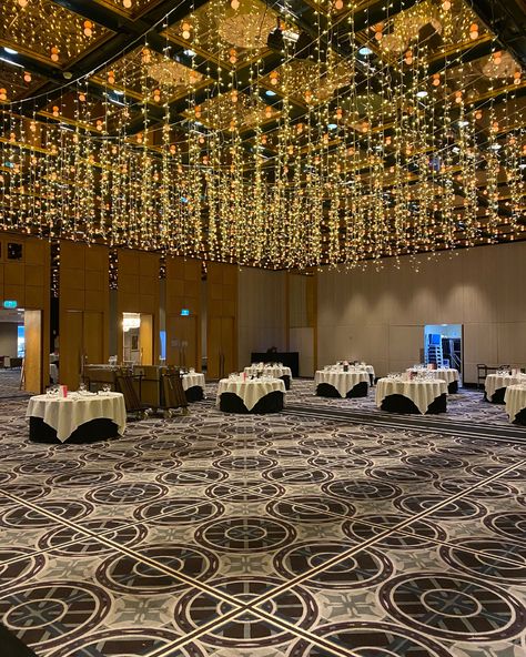 Waterfall fairy light chandelier installation hanging from the ceiling Fairy Light On Ceiling, Wedding Venue Lights Ceilings, Fairy Lights Ceiling Wedding, Fairylight Ceiling, Ceiling Installation Wedding, Fairy Light Chandelier, Fairy Lights Ceiling, Waterfall Fairy, Wedding Fairy Lights