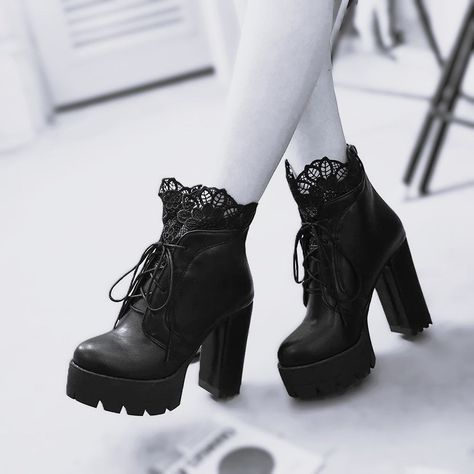 We stock EU Sizes - Please check out our Shoe Size guide before purchasing to make sure you get the right fit for you. Step into the enchanting world of the Dark Fae with these mesmerizing Gothic high-heeled boots. Crafted from matte black faux leather with a delicate lace overlay at the top, these boots exude an ethereal yet dark elegance. The lace-up front allows for a customizable fit, while the back zipper adds convenience, making them easy to slip on and off. Designed with both style and co Goth Heels, Dark Fae, Black Lace Boots, Black Heeled Boots, Goth Boots, Gothic Lace, Goth Shoes, Dark Elegance, Gothic Shoes