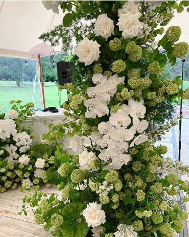 Large White And Green Floral Arrangement, Green Hydrangeas Wedding, Orchid Arch Wedding, Green And White Hydrangea Wedding, White And Green Hydrangea Wedding, Black Tie Spring Wedding, Hydrangea Wedding Aisle, Hydrangea Wedding Arch, Green Hydrangea Bouquet