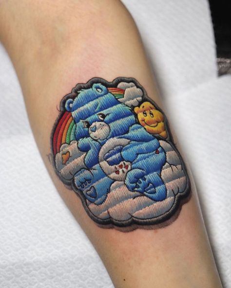 Terioshi Otto on Instagram: “🐻💙 Grump Care Bear . . . . . . #carebears #grumpcarebear #patchtattoo #embroiderytattoooriginal #originalembroiderytattoo…” Grumpy Care Bear Tattoo, Care Bear Tattoo Ideas, Embroidery Tattoo Ideas, Care Bear Tattoo, Tattoo Ideas Women, Bear Tattoo Ideas, Grumpy Care Bear, Candy Tattoo, Care Bear Tattoos