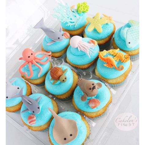 Cakelyn's Finest on Instagram: "Sea creature cupcakes with all of the birthday boy’s favorites! 🐋 . . . #cupcakes #seacreatures #seacreaturecupcakes #edible #cute #fondantcupcaketoppers #madewithsatinice #underthesea #seacupcakes #cakelynsfinest 📷:@dogasaurus_rex 💕" Ocean Themed Cupcakes, Underwater Birthday Cake, Under The Sea Cupcakes, Ocean Cupcakes, Underwater Birthday, Sea Cupcakes, Fishing Cupcakes, Fairy Birthday Cake, Cap Cake