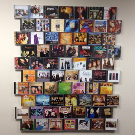 CD storage. CD cases hot glued to a peg board and mounted to a wall. (make sure you have enough space to open them) Great way to display your favorite CD's and have easy access to them at the same time. Ways To Display Cds, Ikea Dvd Storage, Dvd Wall, Dvd Storage Ideas, Diy Dvd Storage, Cd Wall, Wall Storage Systems, Cd Storage, Dvd Storage