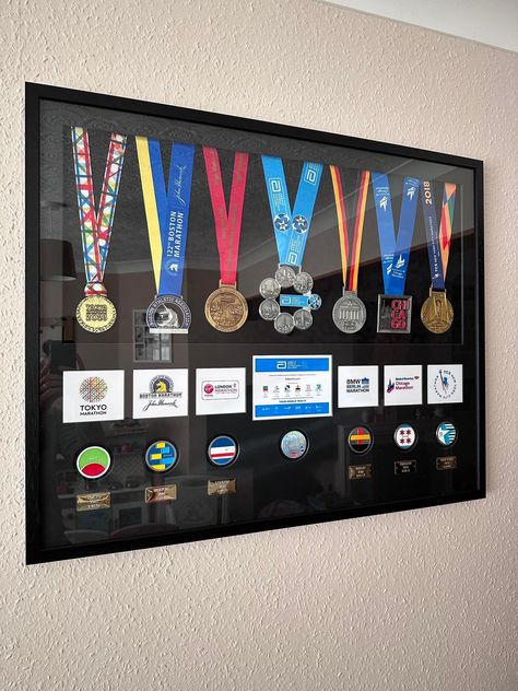 Ironman Medal Display, Aesthetic Medal Display, Marathon Frame Medal Displays, Track Medal Display Ideas, Marathon Vision Board, Sports Medal Display Ideas, Athletic Room Ideas, Medals Display Ideas, Medals Aesthetic