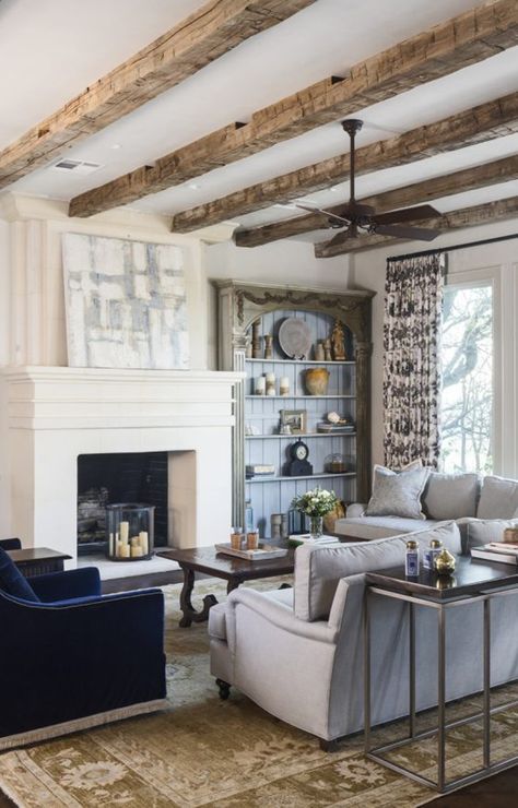 These beautiful Hand Hewn beams were sawn on one side in order to provide a flat surface to mount. The beams offer some rustic charm to this traditional home.  | #handhewnbeams #barnbeams #ceilingbeams #barnwood #rusticdecor #farmhousebeams #handhewn #rusticbaems #woodbeams Wood Beams Living Room, Ceiling Beams Living Room, Flat Ceiling, Beams Living Room, Hand Hewn Beams, Reclaimed Wood Beams, Wood Beam Ceiling, White Oak Floors, Flooring Trends