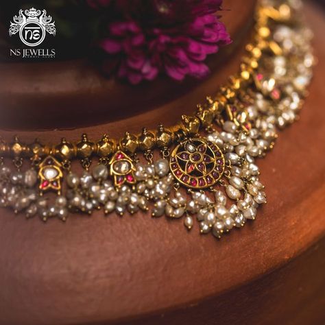 NS Jewells on Instagram: "An old antique Guttapusalu : the pearl embellished traditional gold necklace, a classic heritage jewellery hailing from Andhra Pradesh.

We got lucky to find a vintage one, in such pristine condition!

With all these Basra pearls and Burmese old rubies! Truly a beautiful treasure! 

Find such stunning traditional pieces at NS Jewells, Lavelle Road, Bengaluru.

.
📷 : @romaganeshphotography 
.
.
.
.
.
.

[ jewellery, handmade jewellery, gold, silver, diamonds,emerald, bridal jewellery, wedding jewellery, engagement rings, pearls, necklace, earrings , authentic antiques, gold plated, real gold jewellery]

.
.
.
.
.
.

#everydayjewelry #simplejewelry#handcraftedjewellery #custommadejewellery #jewellery 
#goldjewellery #gold #traditionaljewellery #diamonds #emerald #g Moti And Gold Necklace, Old Jewellery Designs, Pearl Emerald Necklace, Antique Guttapusalu, Old Indian Jewellery, Jewelery Shoot, Basra Pearls, Traditional Gold Necklace, Guttapusalu Haram